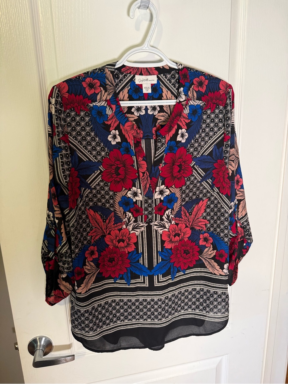 Jaclyn Smith Black Blouse with Red and Blue Floral Motif
